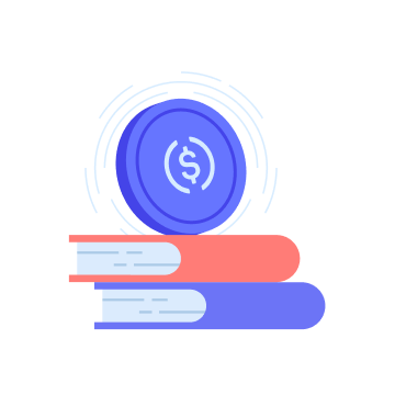 USDC token on top of a stack of books